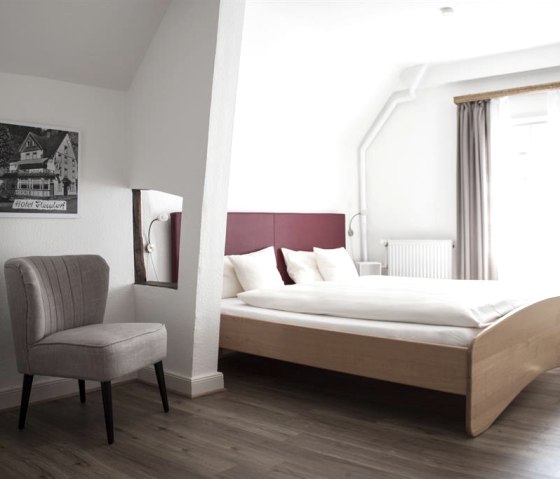 Chambre à coucher App. "An der Aukirche", © Hotel Flosdorff