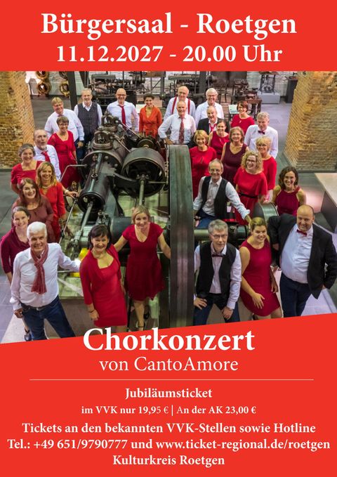 Ein Schwarz-Weiß-Porträt von Wilfried Schmickler. Er schaut ernst in die Kamera und hält seine Hand auf eine markante Weise.
